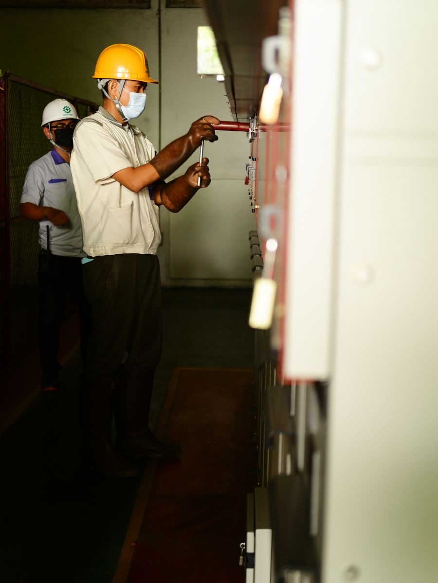 Electricians carrying out installation work