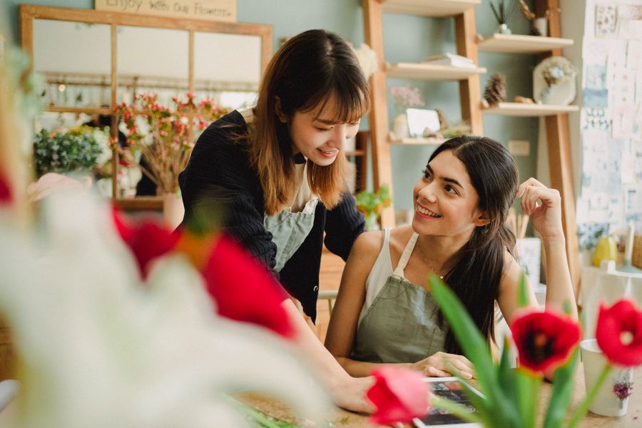 Florists preparing flowers in a local shop